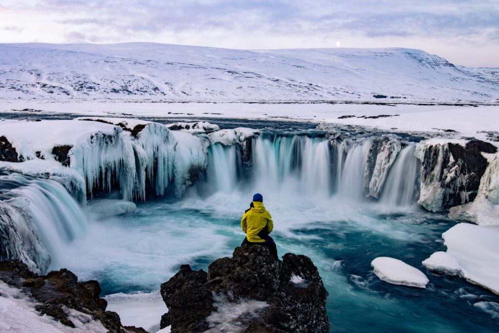 Man at Godafoss Iceland in Winter