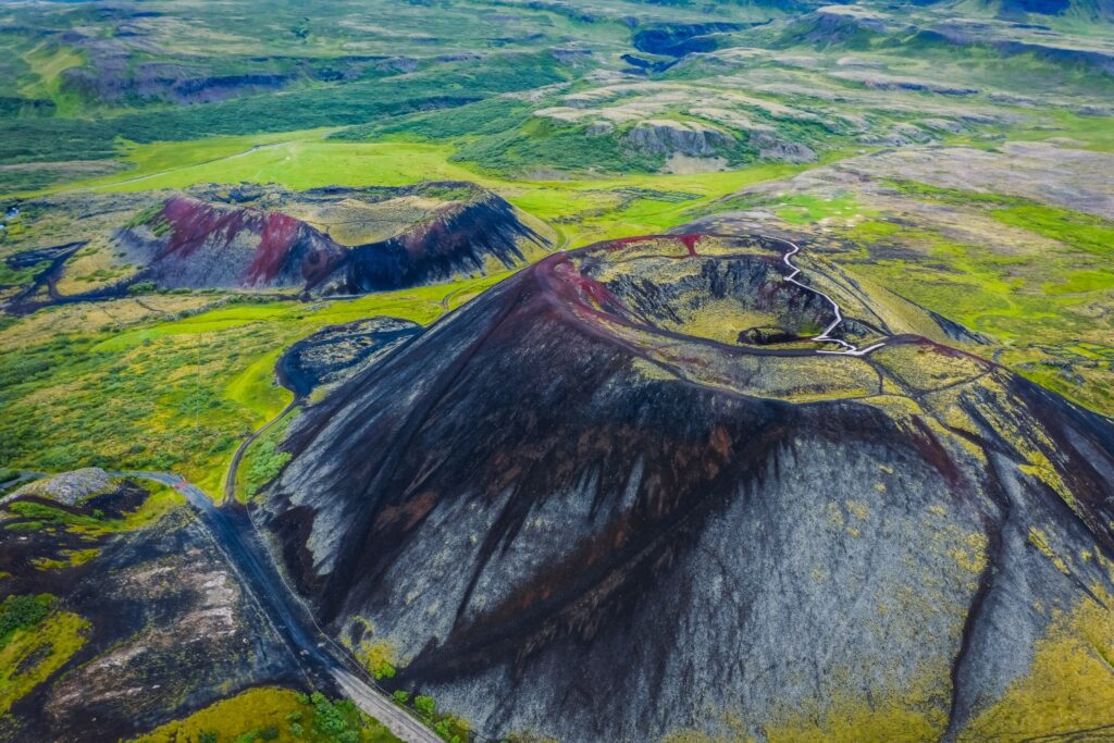 Aerial panoramic views of Grabrok volcano and lava valley from in Iceland.