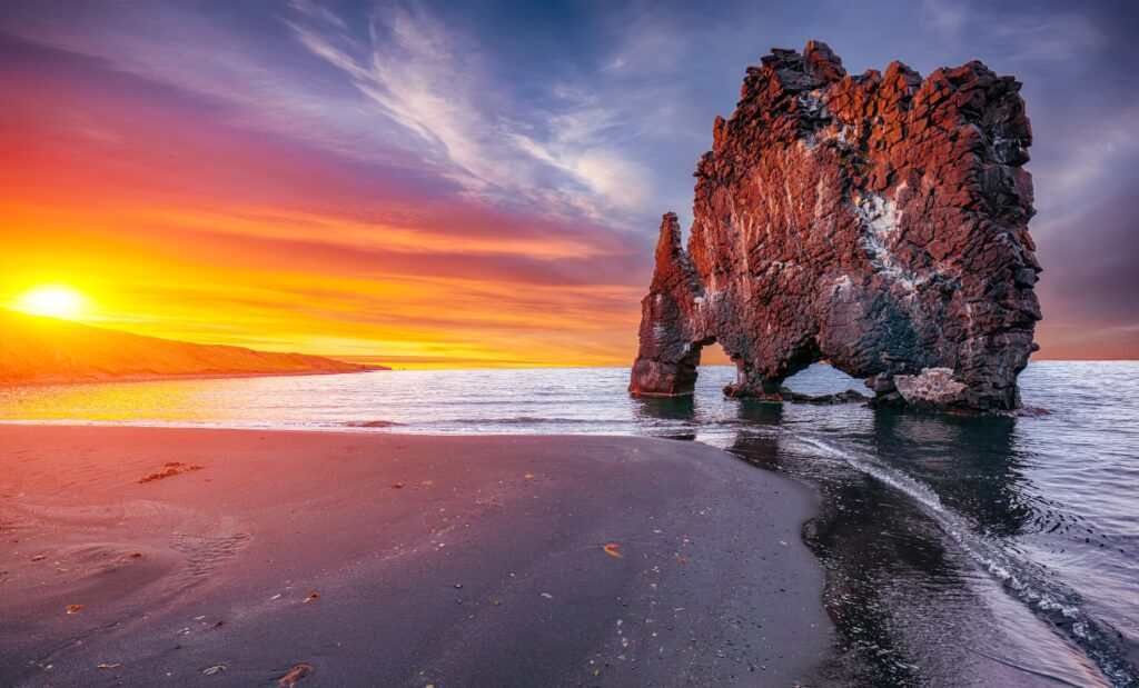 Dramatic sunset view of Hvitserkur unique basalt rock in Iceland